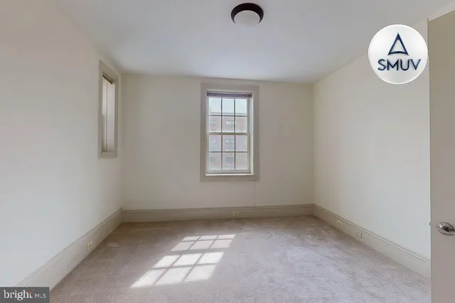 an empty room with a window
