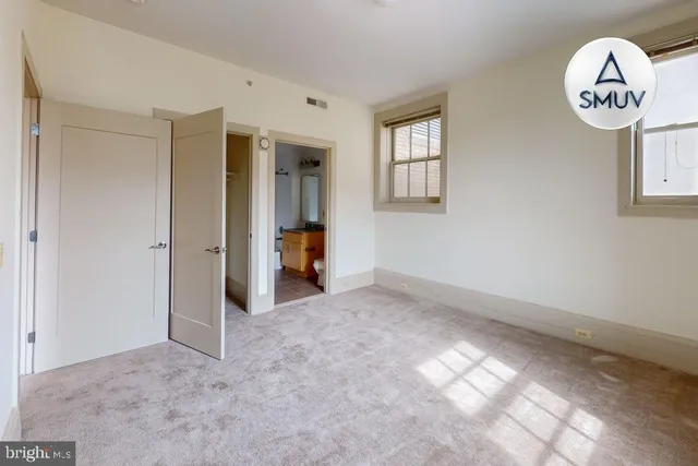 a view of a room with toys and closet