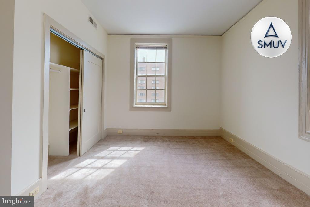 11 East Chase Street, Unit 506 Baltimore, MD 21202 - Photo 23 of 32 Bright and airy room with natural light.