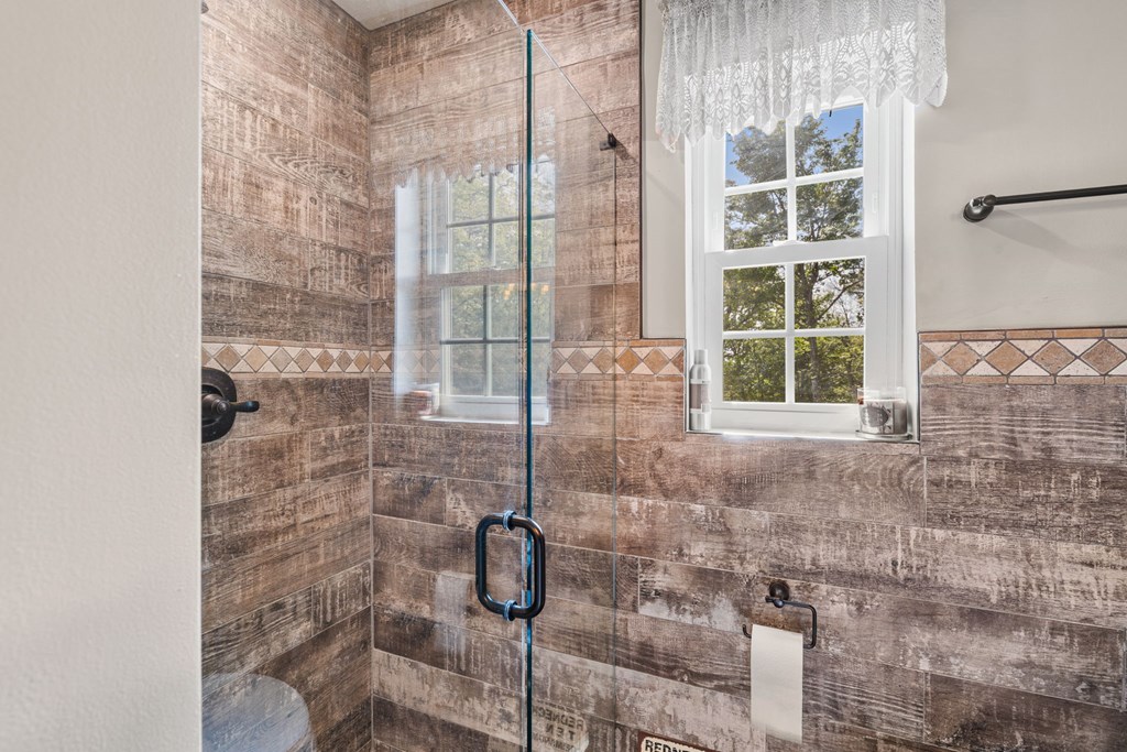 619 Pounding Mill Loop Hayesville, NC 28904 - Photo 41 of 54 a bathroom with a shower