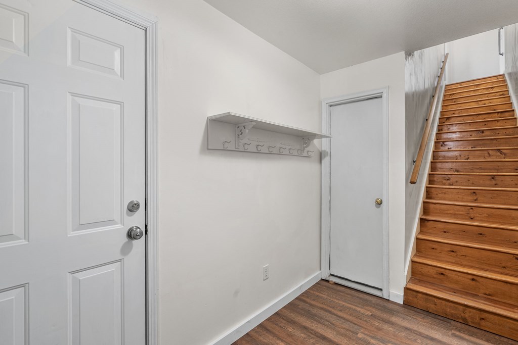 619 Pounding Mill Loop Hayesville, NC 28904 - Photo 42 of 54 a view of walk in closet with wooden floor