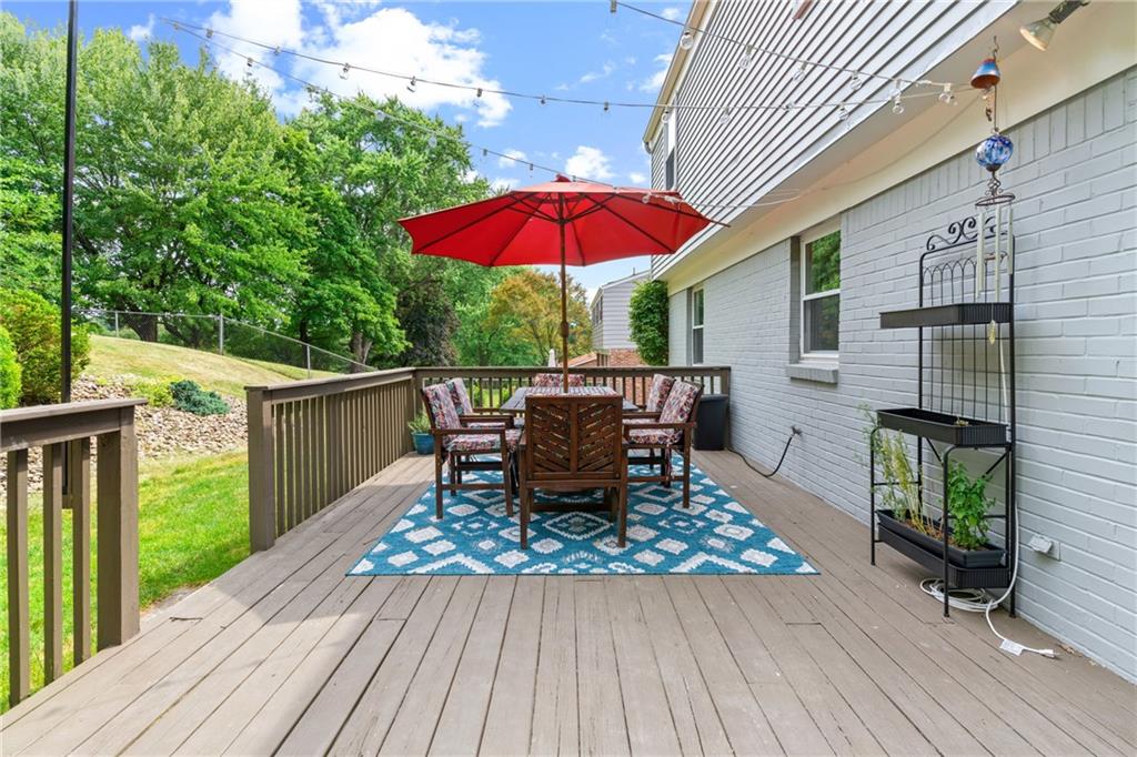 9342 Doral Drive Pittsburgh, PA 15237 - Photo 31 of 40 a table and chairs in patio of a house