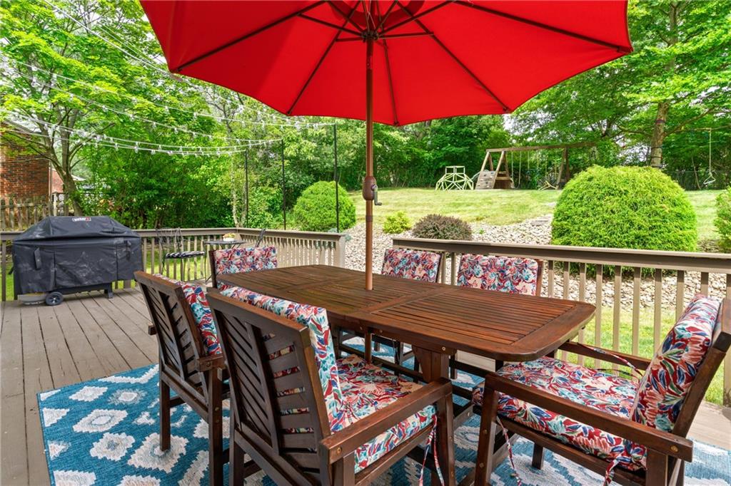 9342 Doral Drive Pittsburgh, PA 15237 - Photo 32 of 40 a view of an outdoor sitting area with furniture and wooden deck