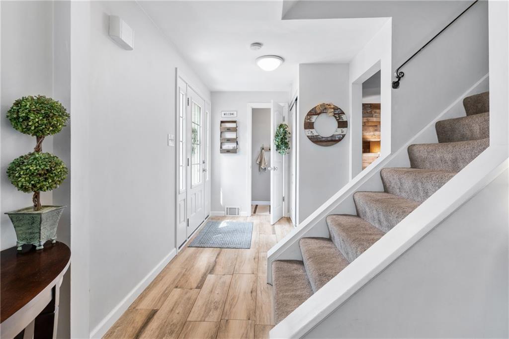 9342 Doral Drive Pittsburgh, PA 15237 - Photo 5 of 40 a view of entryway and hall with wooden floor