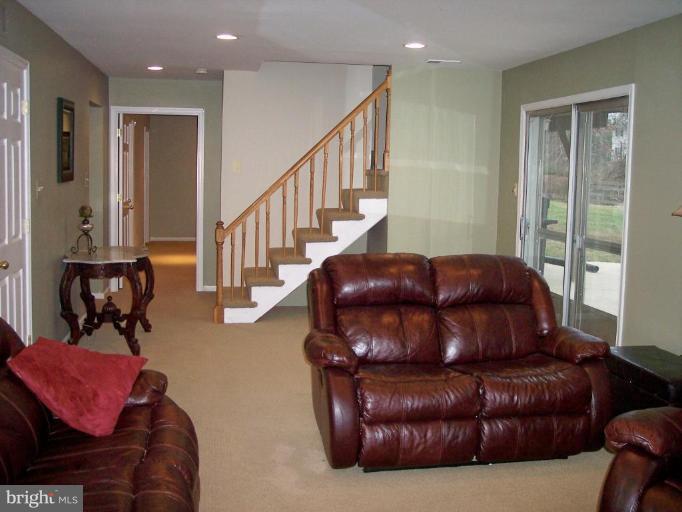 1311 Marchmont Court Reston, VA 20190 - Photo 23 of 30 Family Room Towards 2nd Master Bedroom