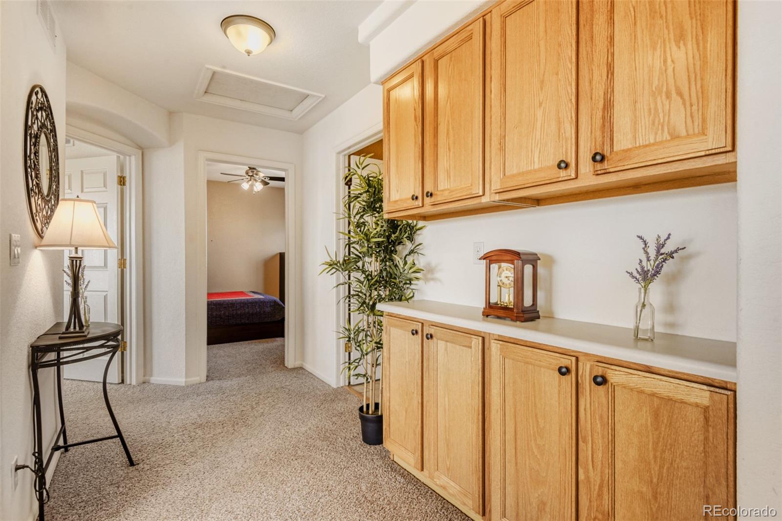 9649 Adelaide Circle Highlands Ranch, CO 80130 - Photo 11 of 32 a view of hallway with livingroom and furniture