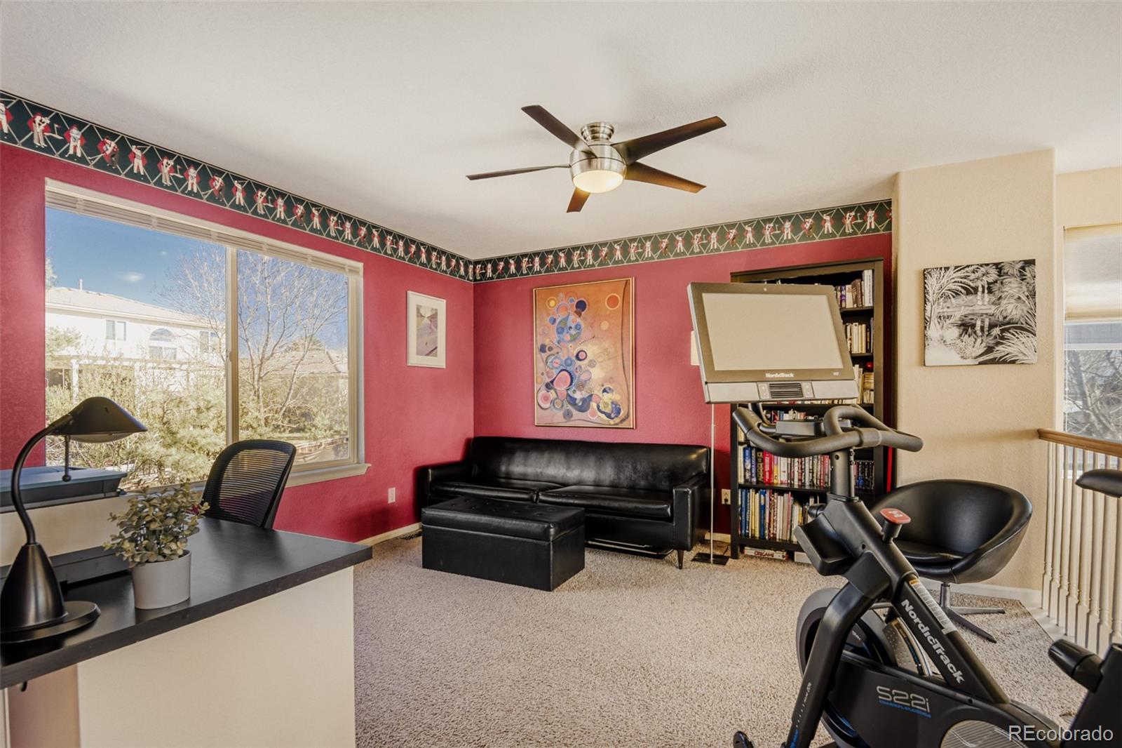 9649 Adelaide Circle Highlands Ranch, CO 80130 - Photo 12 of 32 a view of a workspace with furniture and a window