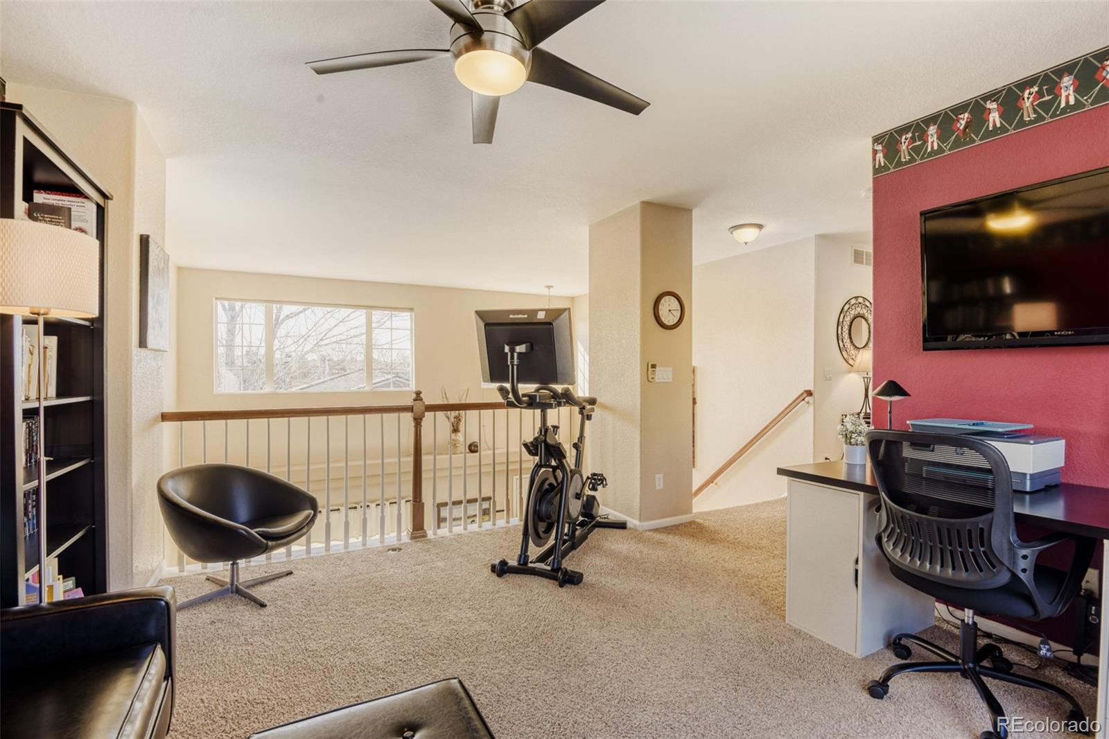 9649 Adelaide Circle Highlands Ranch, CO 80130 - Photo 13 of 32 a view of a livingroom with workspace and a window