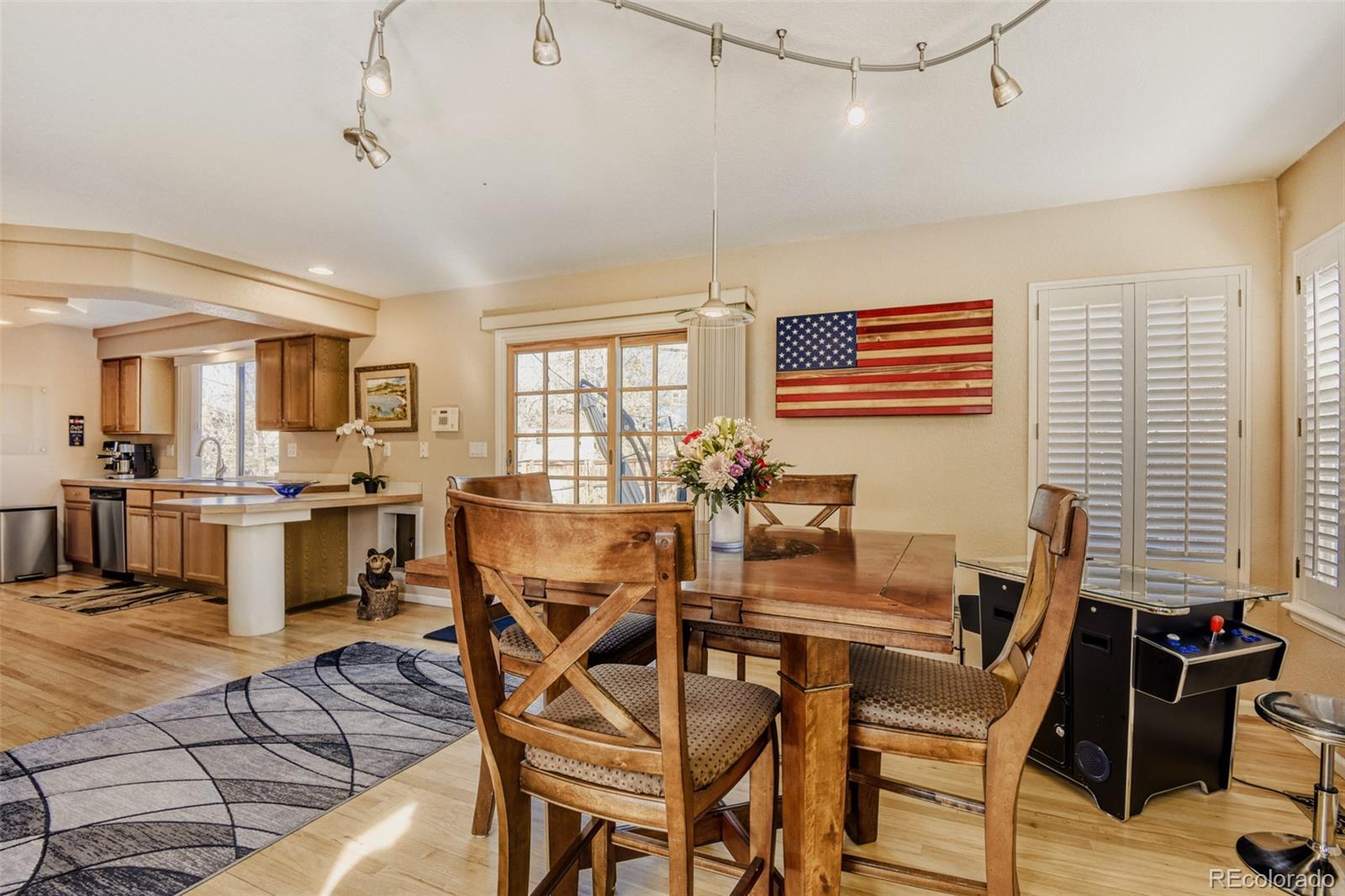 9649 Adelaide Circle Highlands Ranch, CO 80130 - Photo 6 of 32 a dining room with furniture and window