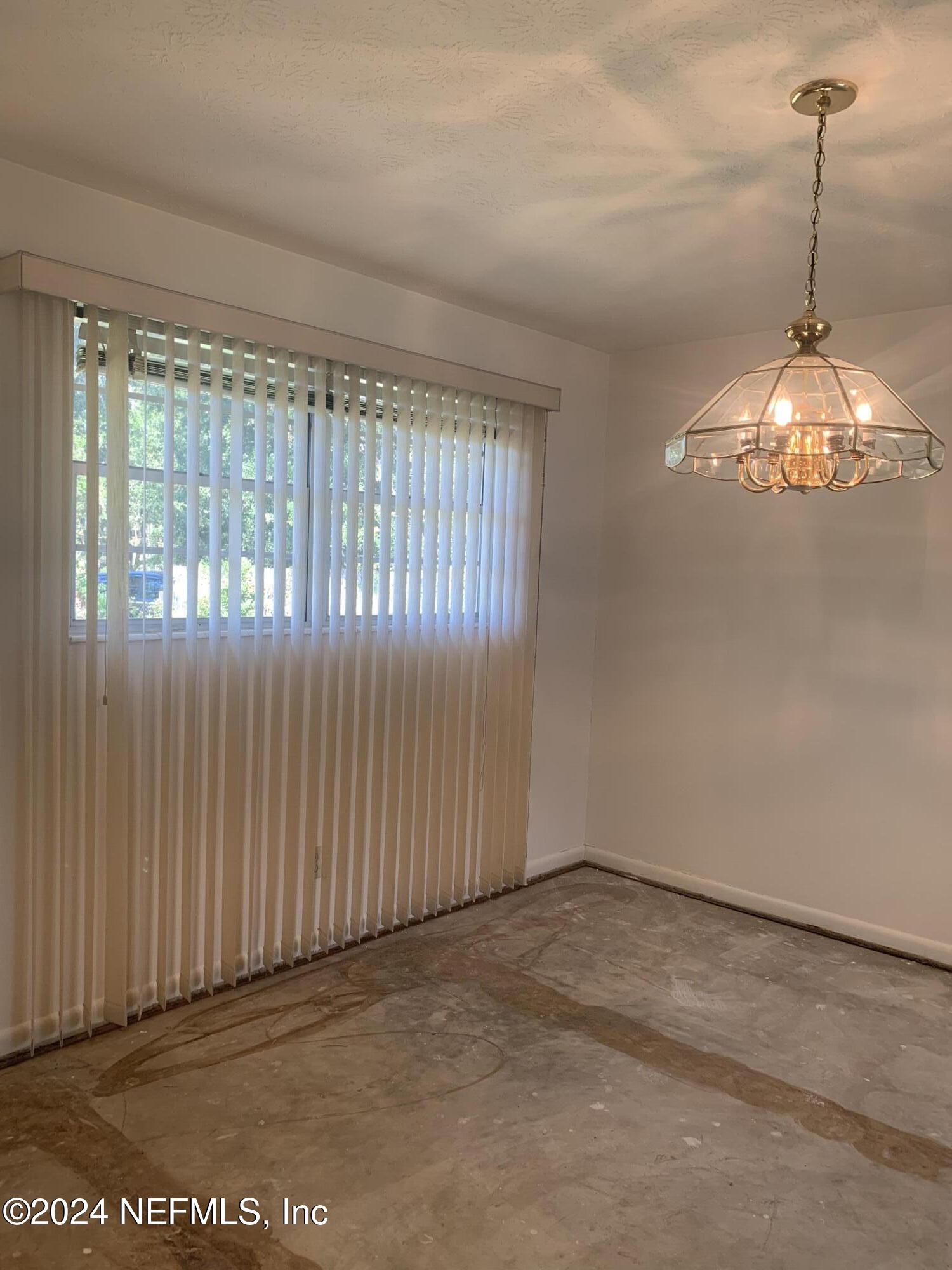 10558 Tulsa Road Jacksonville, FL 32218 - Photo 14 of 24 a view of a room has a large window