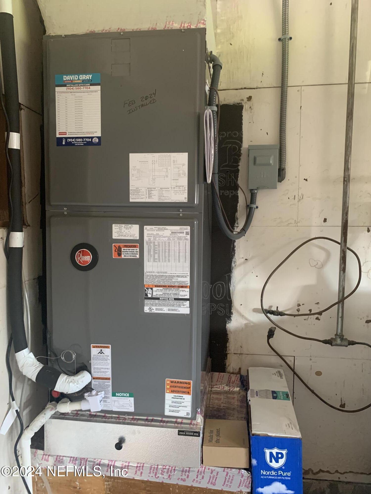 10558 Tulsa Road Jacksonville, FL 32218 - Photo 20 of 24 a bathroom with a sink and mirror