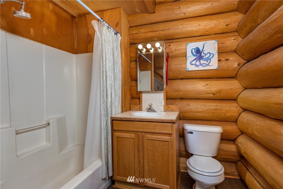 5720 Cameron Road Freeland, WA 98249 - Photo 20 of 36 a bathroom with a toilet and a sink