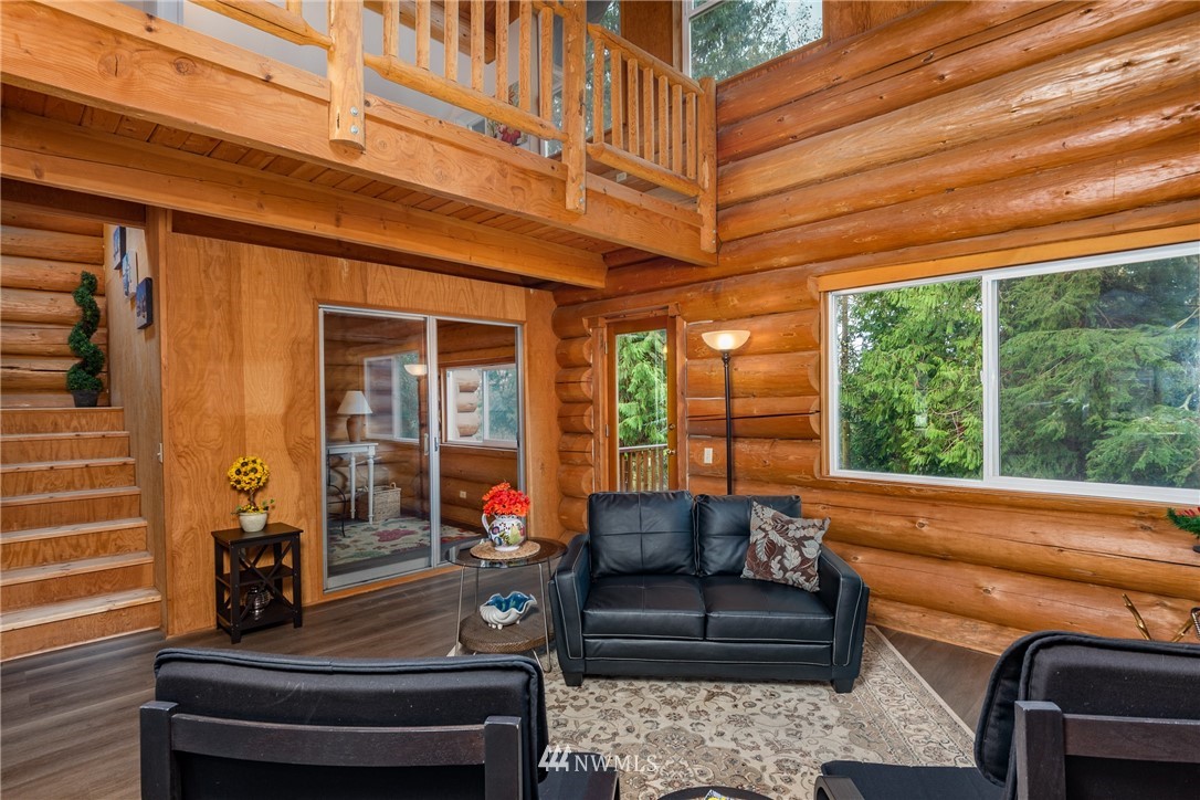 5720 Cameron Road Freeland, WA 98249 - Photo 21 of 36 a outdoor living space with patio furniture and a potted plant