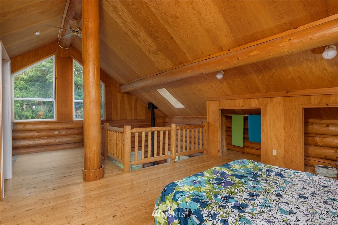 5720 Cameron Road Freeland, WA 98249 - Photo 27 of 36 a bedroom with a bed and a view of bedroom