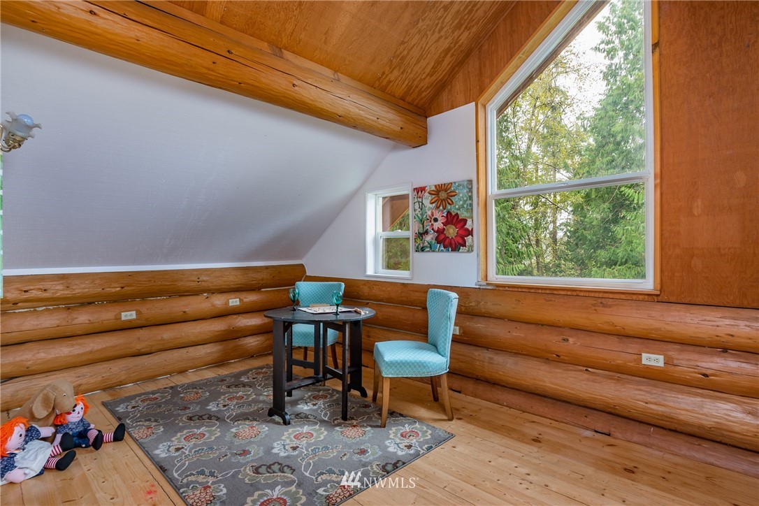 5720 Cameron Road Freeland, WA 98249 - Photo 30 of 36 a reading room with furniture and a window