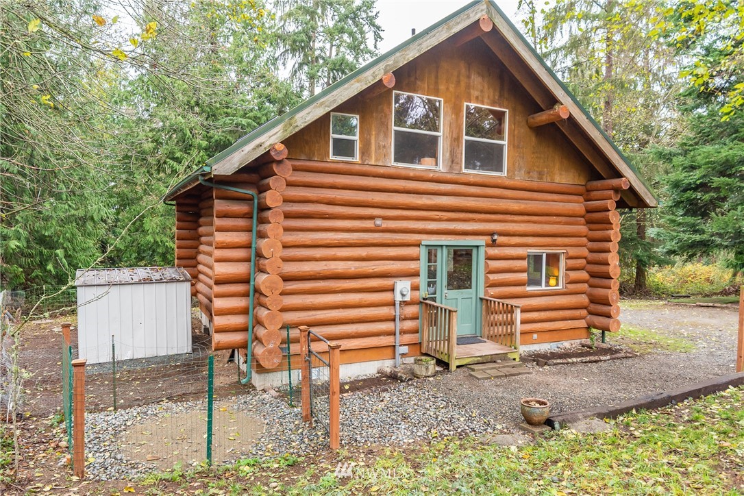 5720 Cameron Road Freeland, WA 98249 - Photo 6 of 36 a front view of a house with a yard