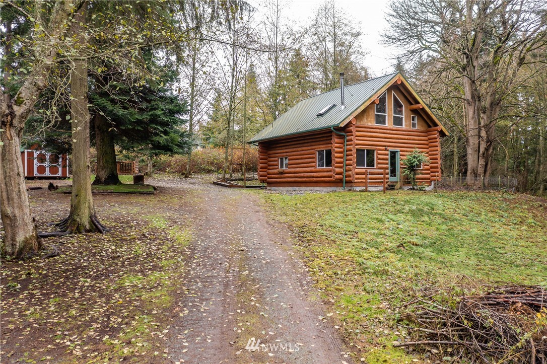 5720 Cameron Road Freeland, WA 98249 - Photo 9 of 36 a view of a house with a yard