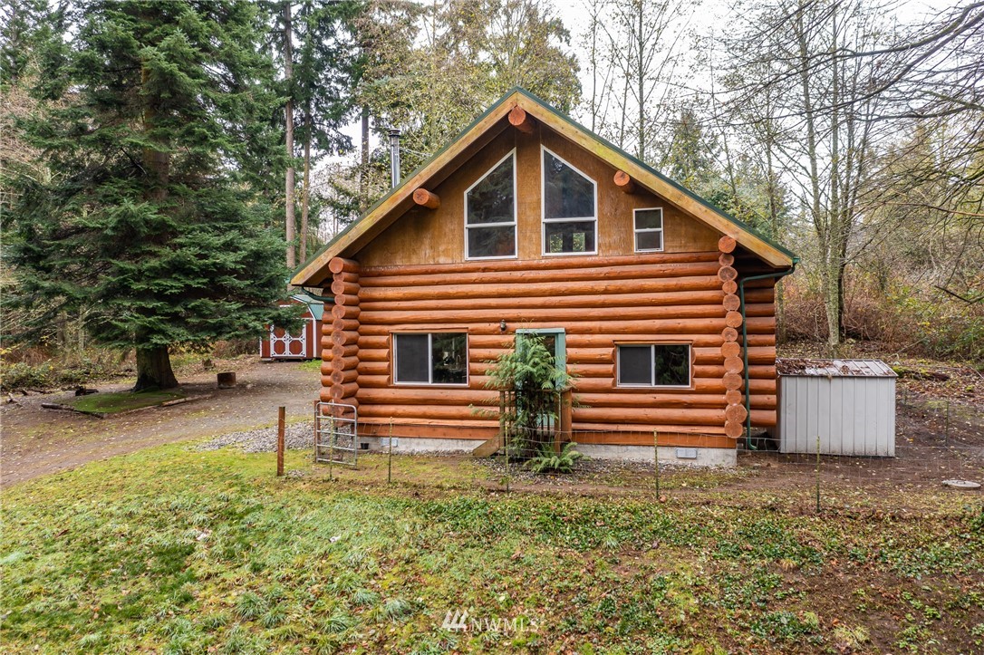 5720 Cameron Road Freeland, WA 98249 - Photo 10 of 36 a front view of a house with a yard
