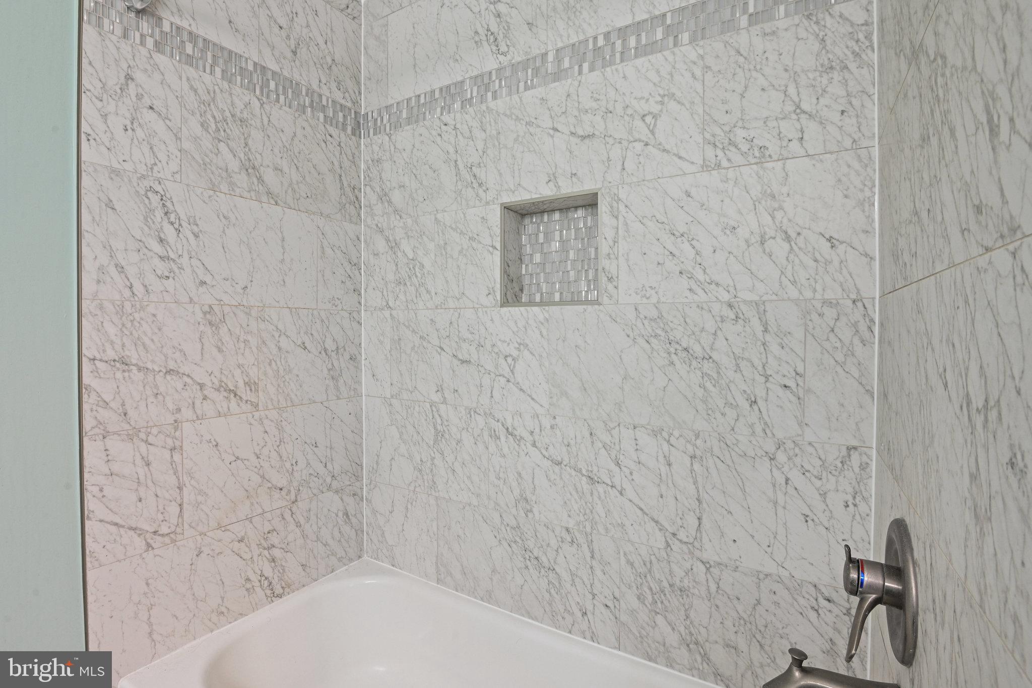 21174 Wildflower Square Ashburn, VA 20147 - Photo 15 of 30 a bathroom with a shower