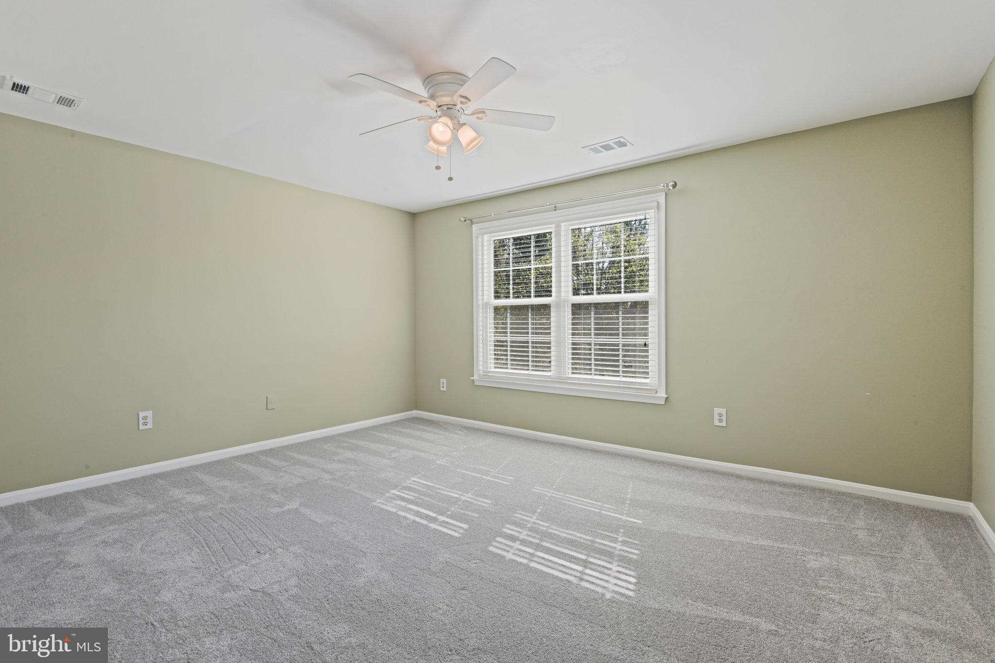 21174 Wildflower Square Ashburn, VA 20147 - Photo 18 of 30 an empty room with windows