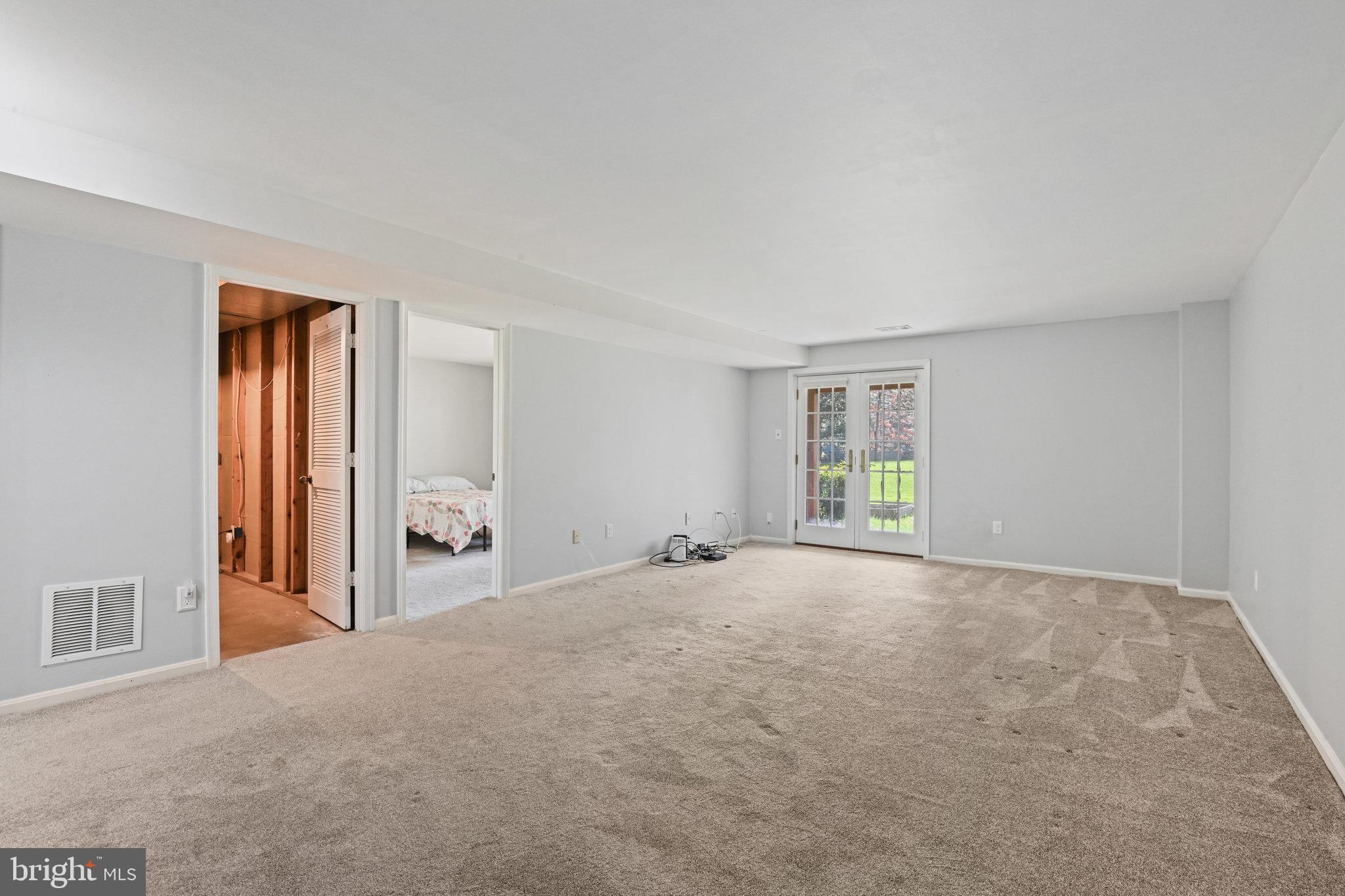 21174 Wildflower Square Ashburn, VA 20147 - Photo 21 of 30 a view of an empty room with window