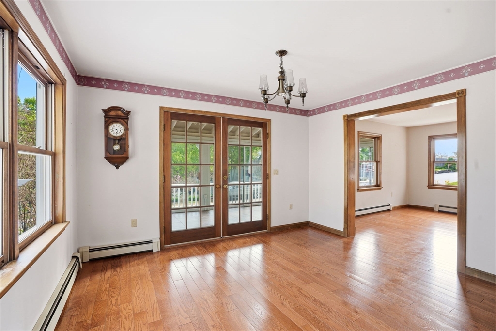 67 Wituwamat Road Weymouth, MA 02191 - Photo 5 of 42 a view of empty room with wooden floor and fan