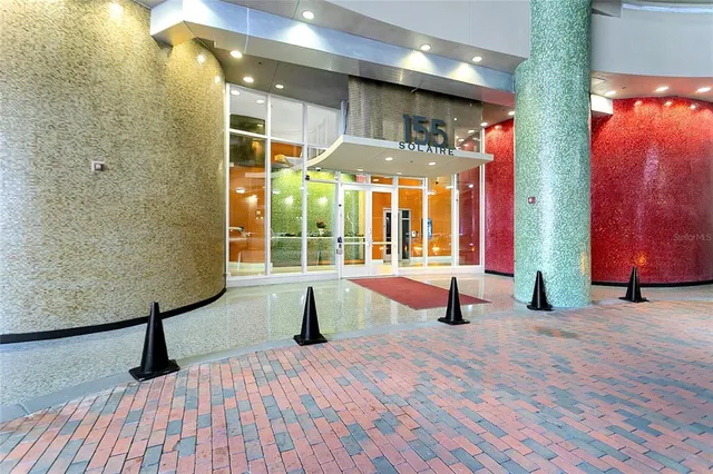 a view of swimming pool with seating space