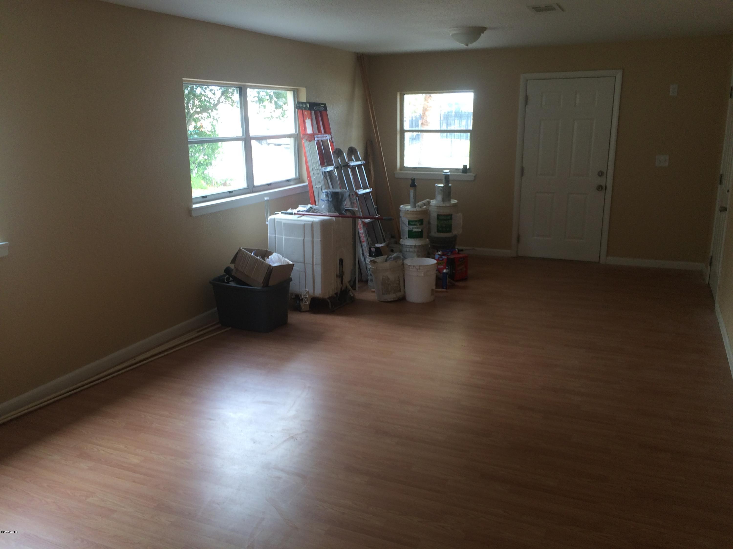 1040 Hickory Lane Cocoa, FL 32922 - Photo 17 of 17 a view of a livingroom with furniture and a window