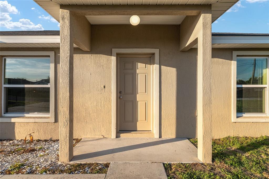 71 Juniper Trail Loop Ocala, FL 34480 - Photo 11 of 58 a view of a door front of a house