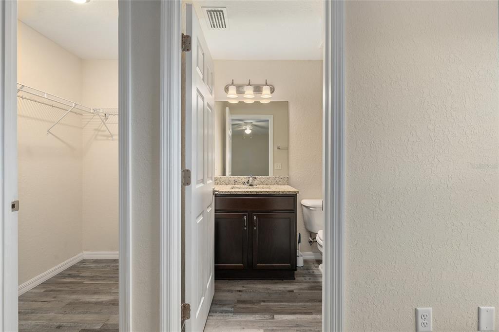 71 Juniper Trail Loop Ocala, FL 34480 - Photo 36 of 58 a bathroom with a sink and a mirror