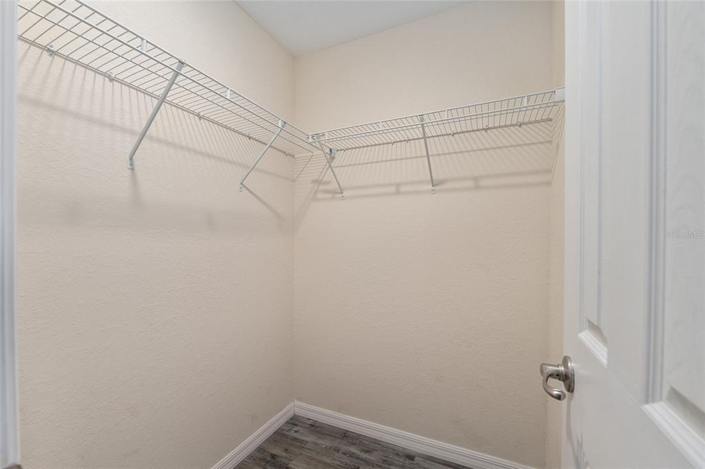 71 Juniper Trail Loop Ocala, FL 34480 - Photo 38 of 58 a view of a room with racks on the wall