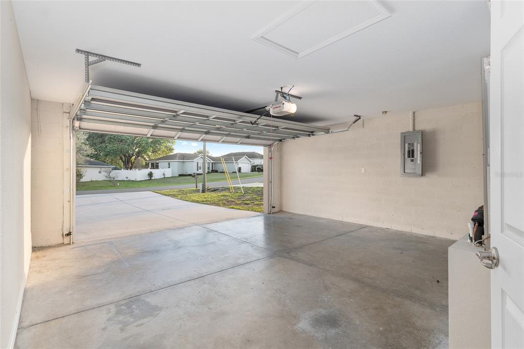 71 Juniper Trail Loop Ocala, FL 34480 - Photo 46 of 58 a view of an empty room with a sliding door