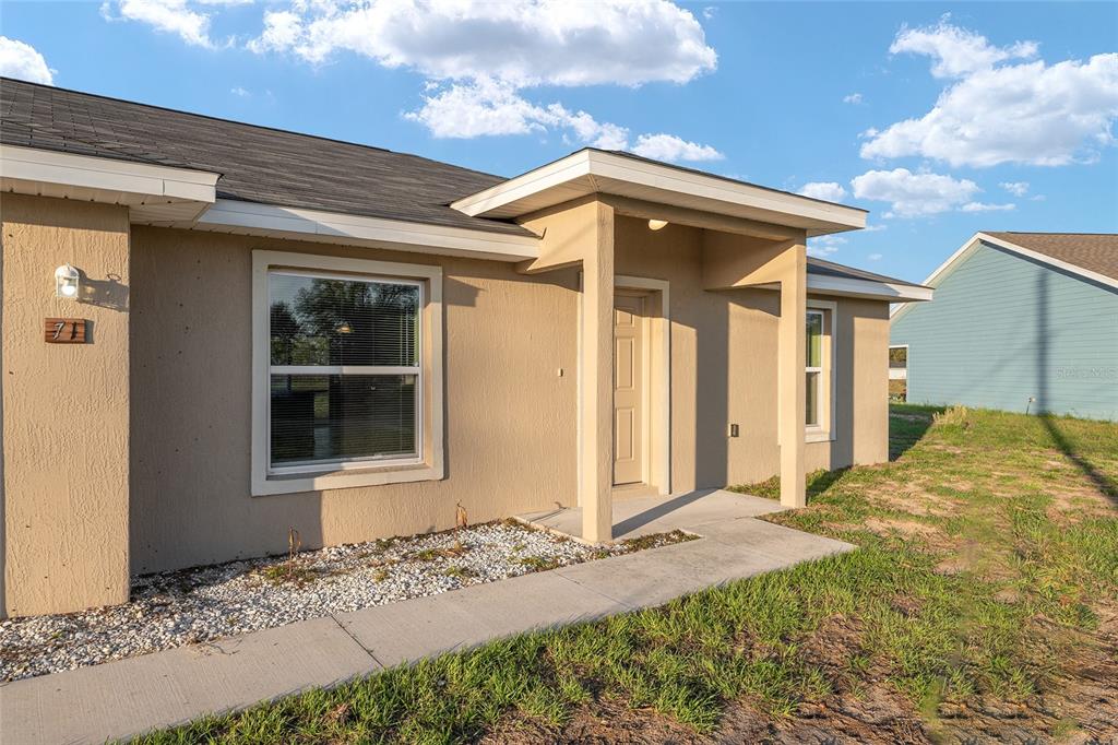 71 Juniper Trail Loop Ocala, FL 34480 - Photo 10 of 58 a front view of a house