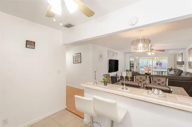 a view of a dining room with furniture