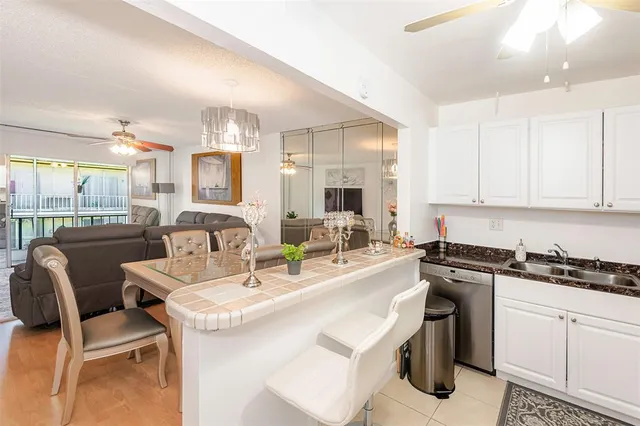 a kitchen with a sink cabinets and counter space