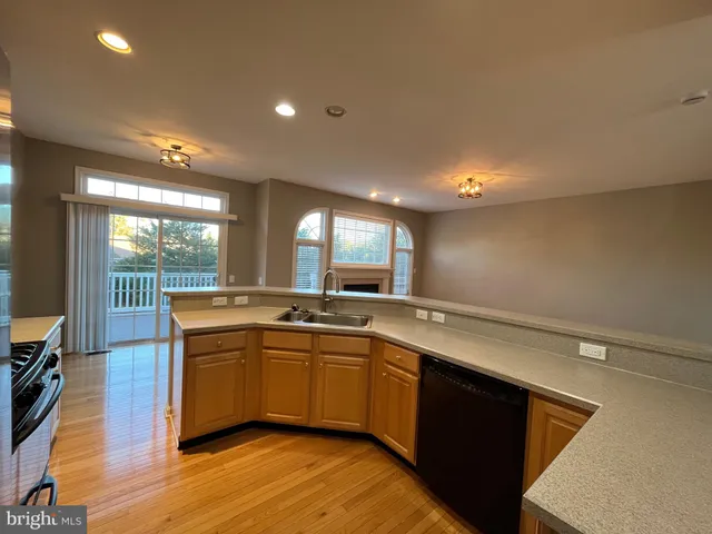 a view of kitchen with wooden floor