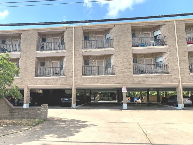 a front view of a building with a glass door