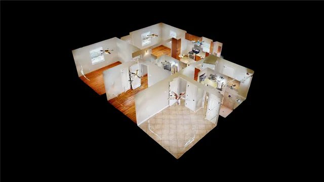 a view of backyard with house and a large tree