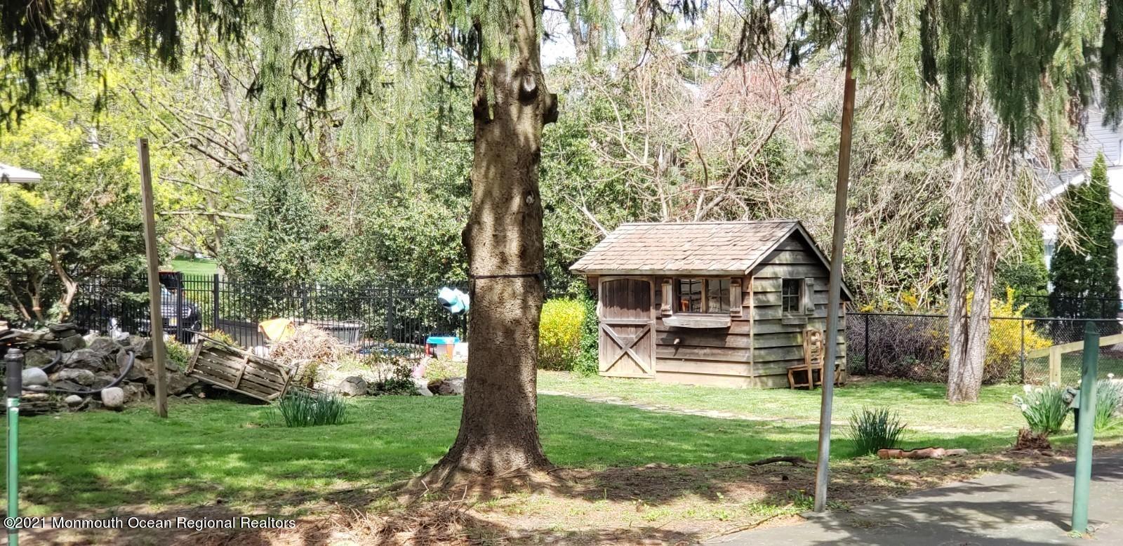 25 Half Mile Road Red Bank, NJ 07701 - Photo 5 of 5 a view of a house with a yard