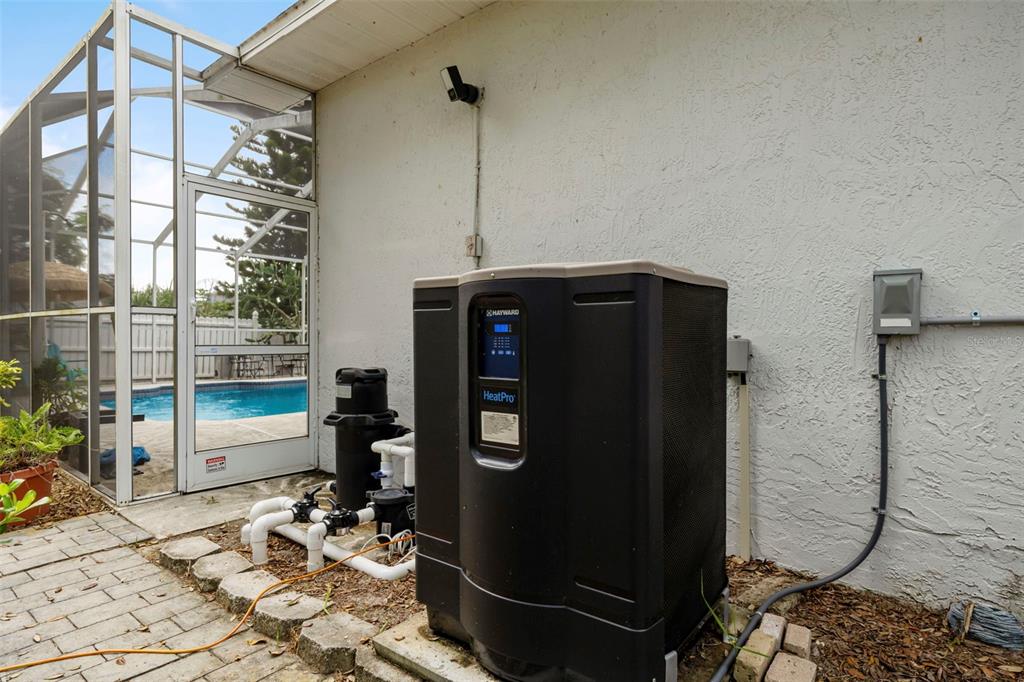 818 Eunice Drive Tarpon Springs, FL 34689 - Photo 39 of 59 a bathroom with a toilet and a shower