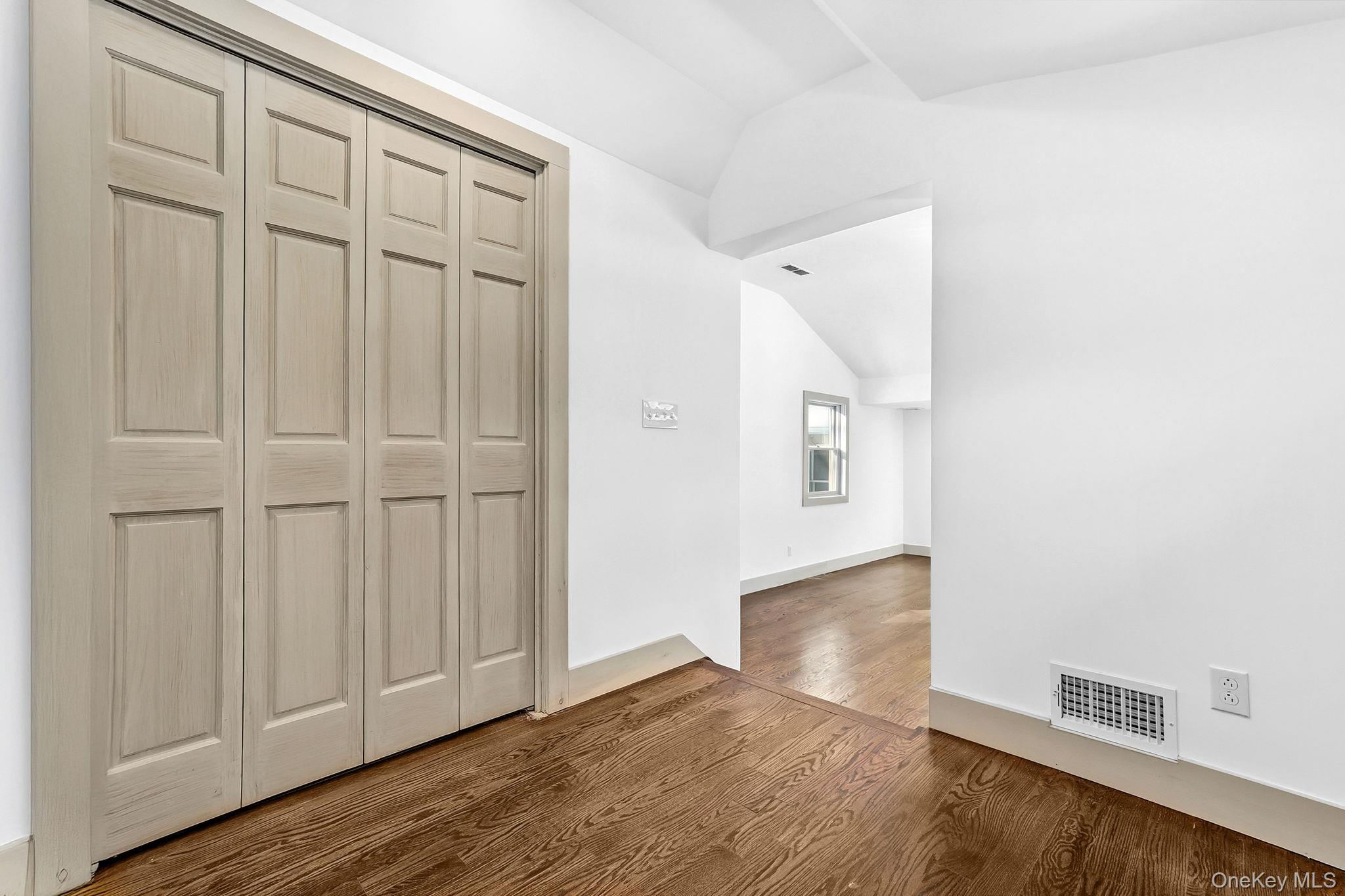 344 Schultz Hill Road Rhinebeck, NY 12572 - Photo 27 of 43 Additional living space featuring lofted ceiling and dark wood-type flooring