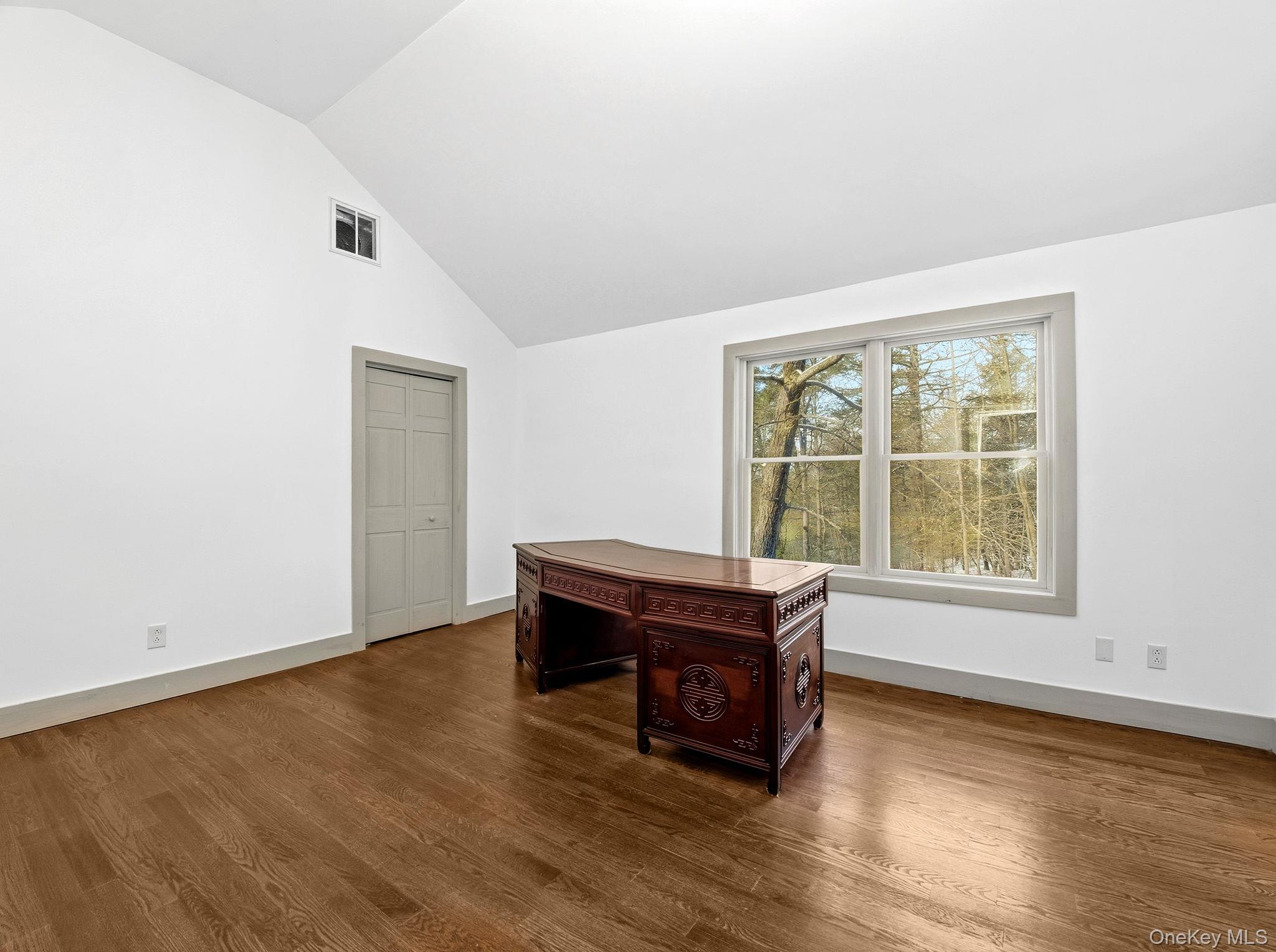 344 Schultz Hill Road Rhinebeck, NY 12572 - Photo 28 of 43 Unfurnished room featuring vaulted ceiling and wood finished floors