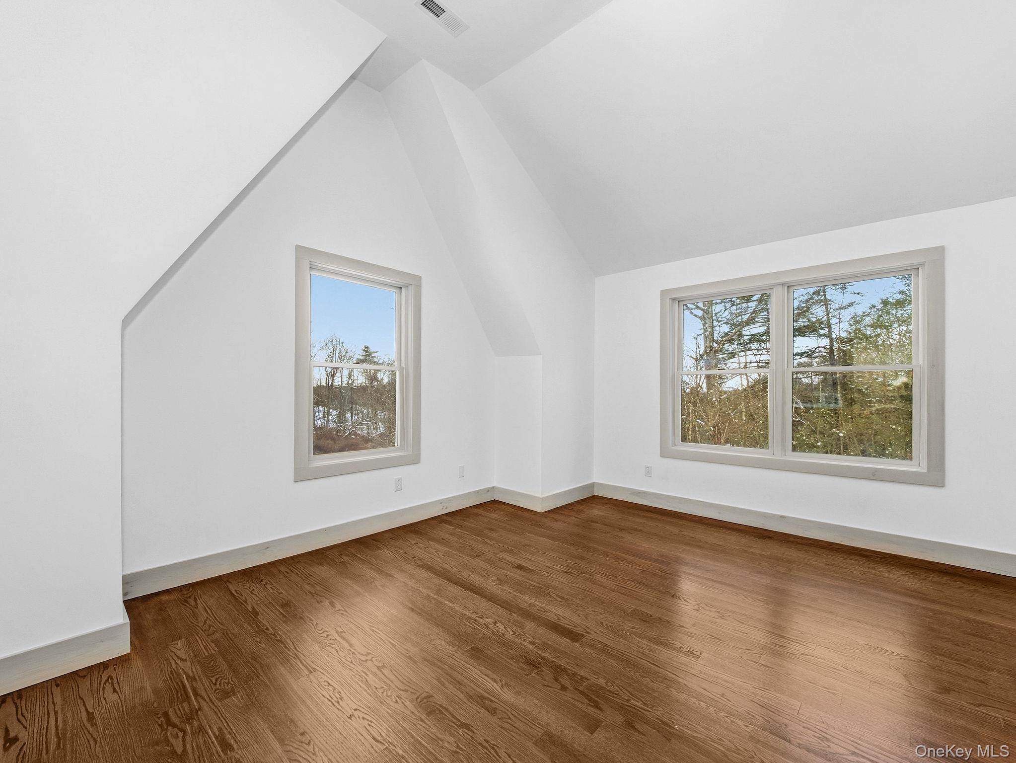 344 Schultz Hill Road Rhinebeck, NY 12572 - Photo 31 of 43 Bonus room with wood finished floors and lofted ceiling