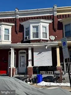 a front view of house with yard