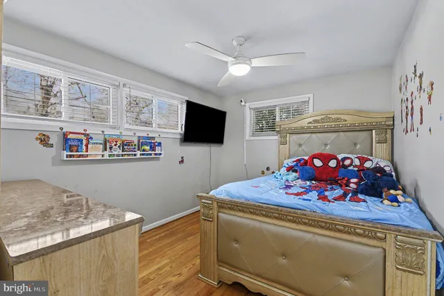 a room with furniture and flat screen tv