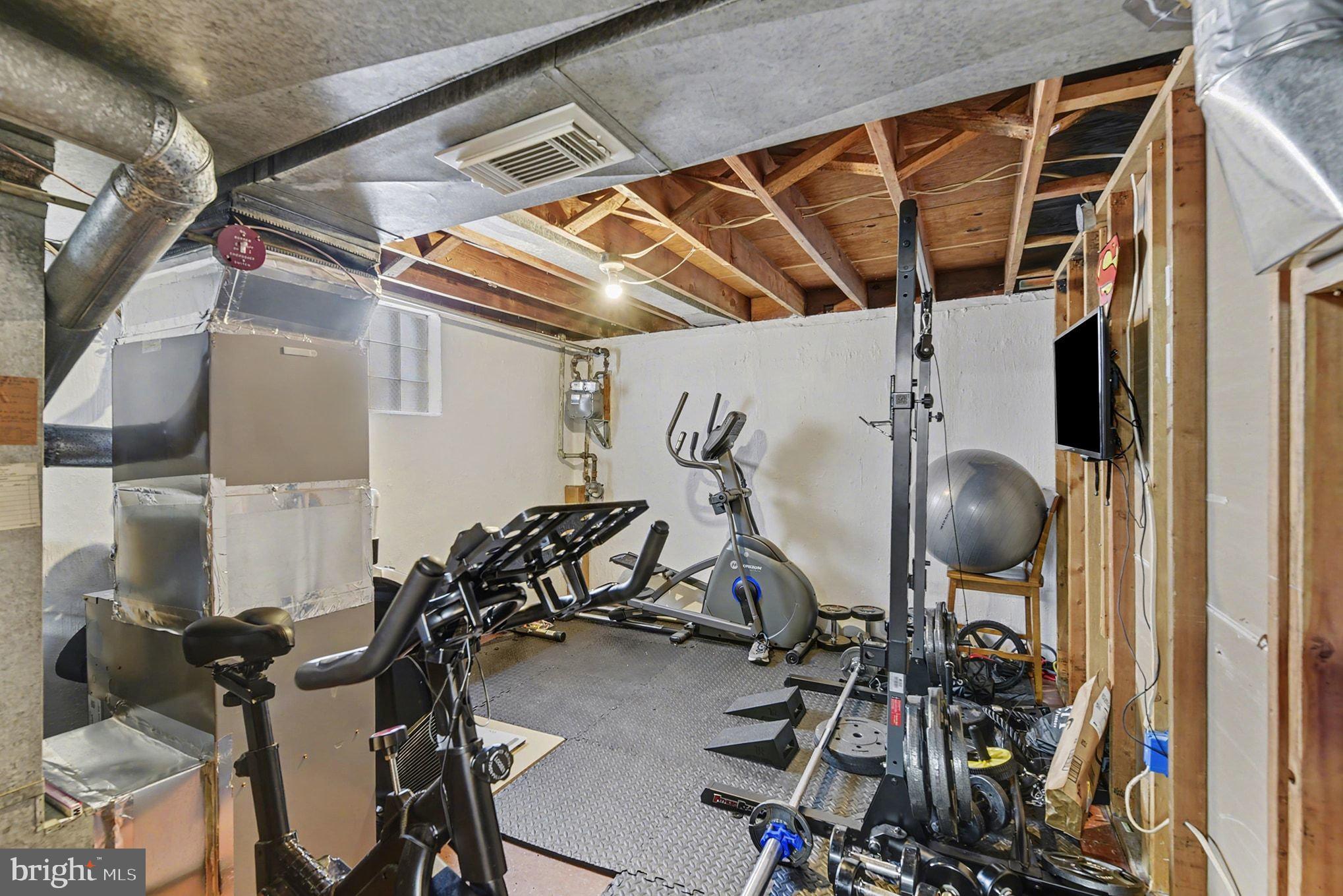 8806 Lakewood Road Parkville, MD 21234 - Photo 21 of 28 a view of a room with gym equipment