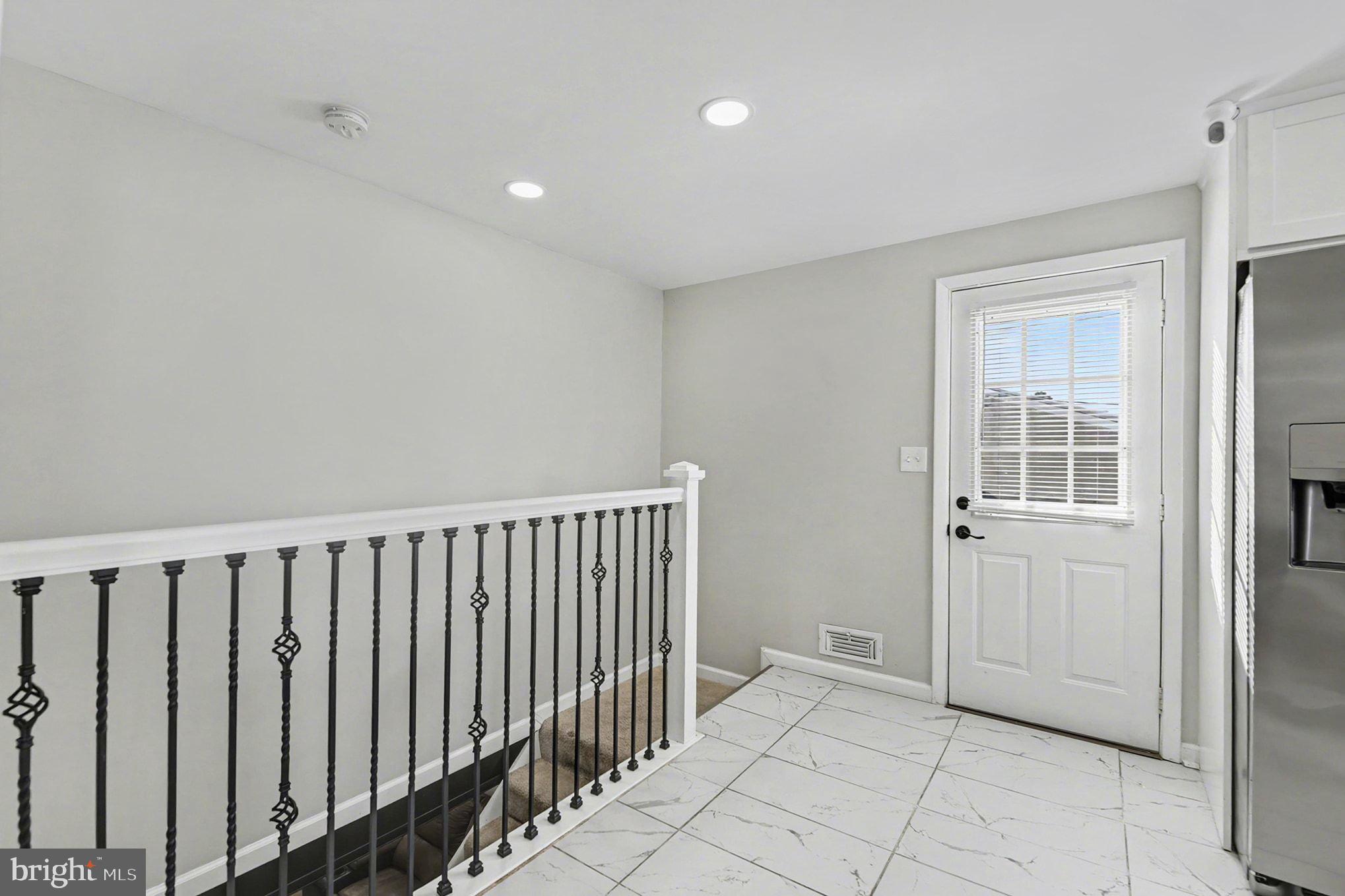 8806 Lakewood Road Parkville, MD 21234 - Photo 10 of 28 a view of a hallway with entryway door