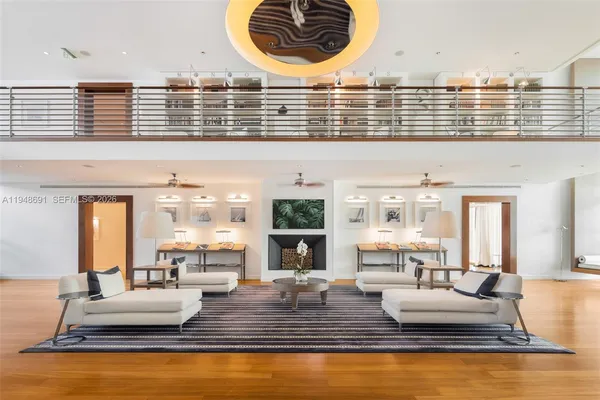 a large room with lots of table and chairs