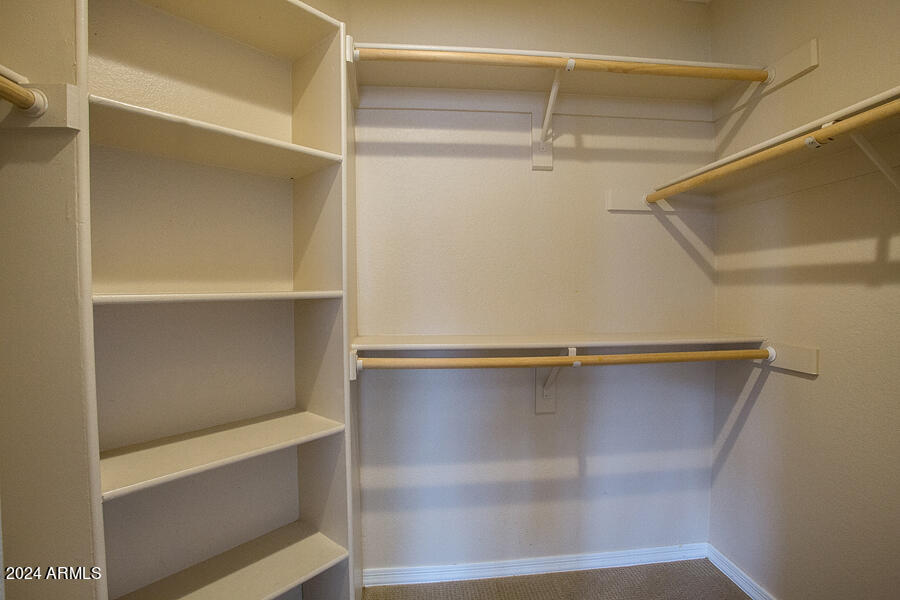 3235 East Camelback Road, Unit 109 Phoenix, AZ 85018 - Photo 15 of 20 a view of an empty walk in closet