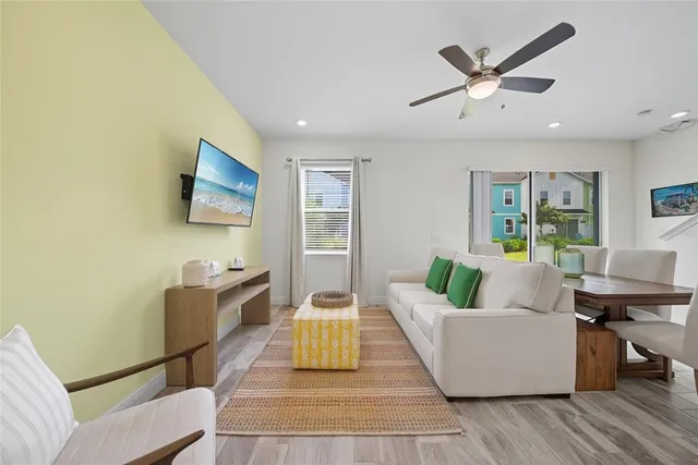 a living room with furniture and a window